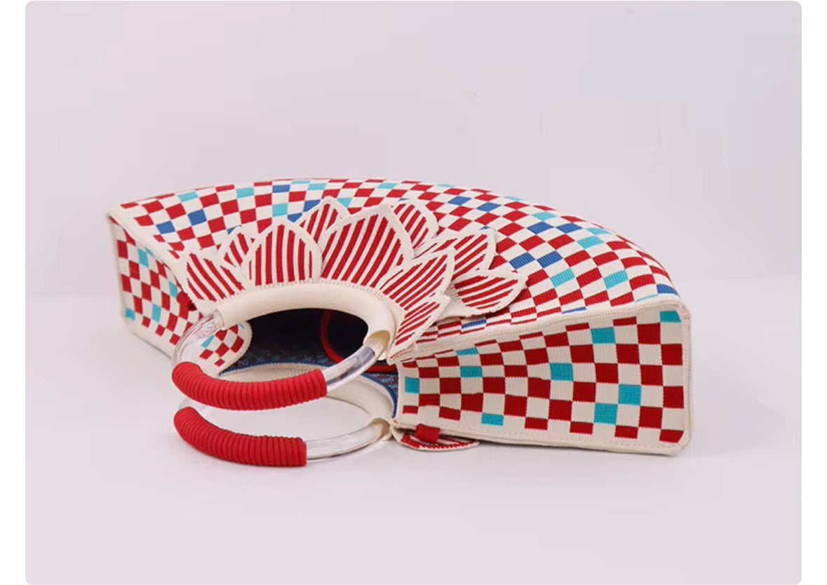 Knitted red and blue handbag