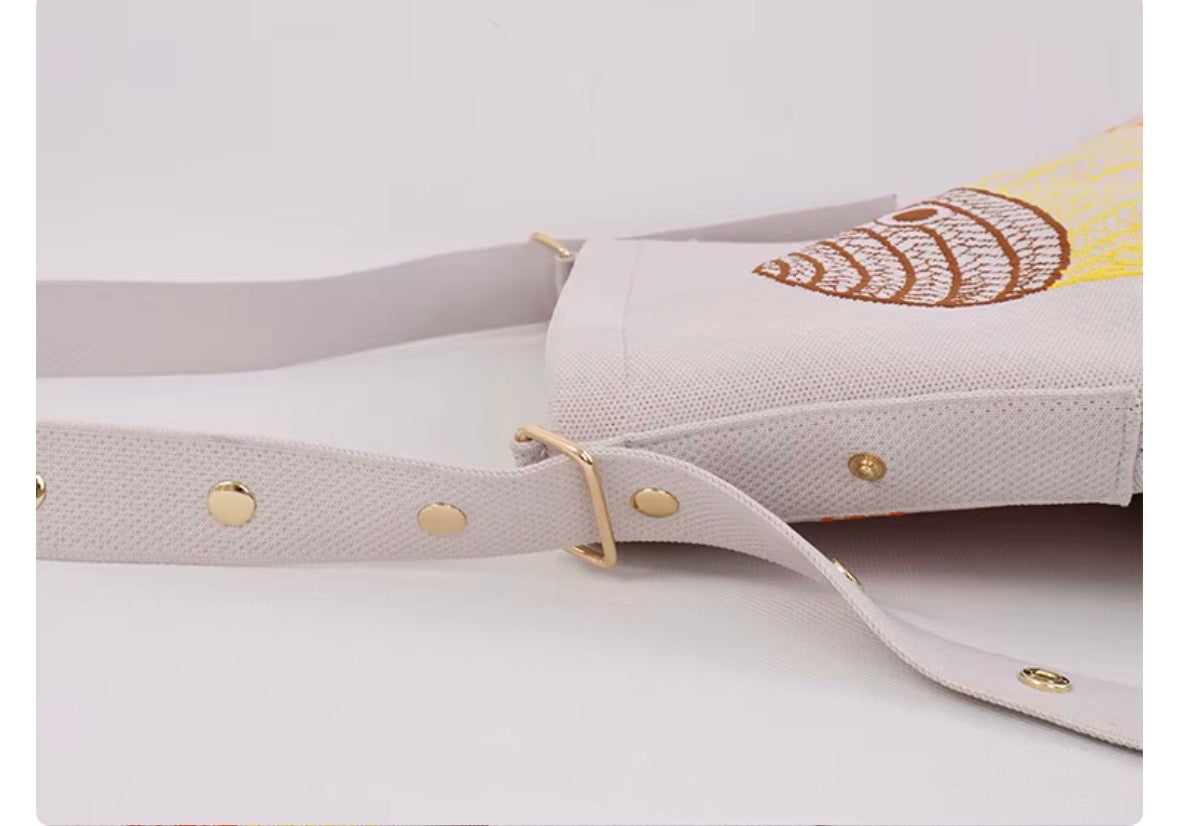Beige embroidered shoulder bag