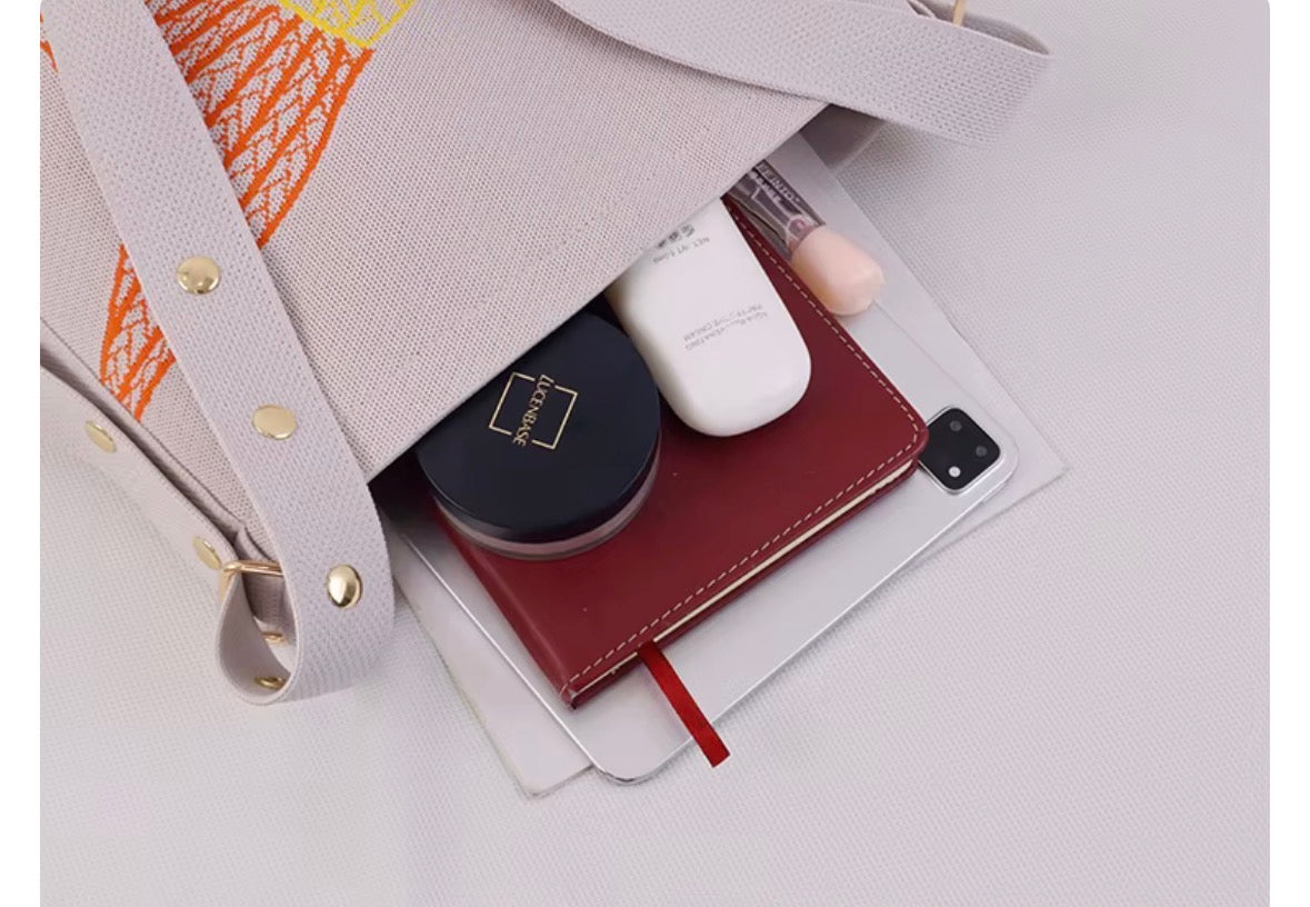 Beige embroidered shoulder bag